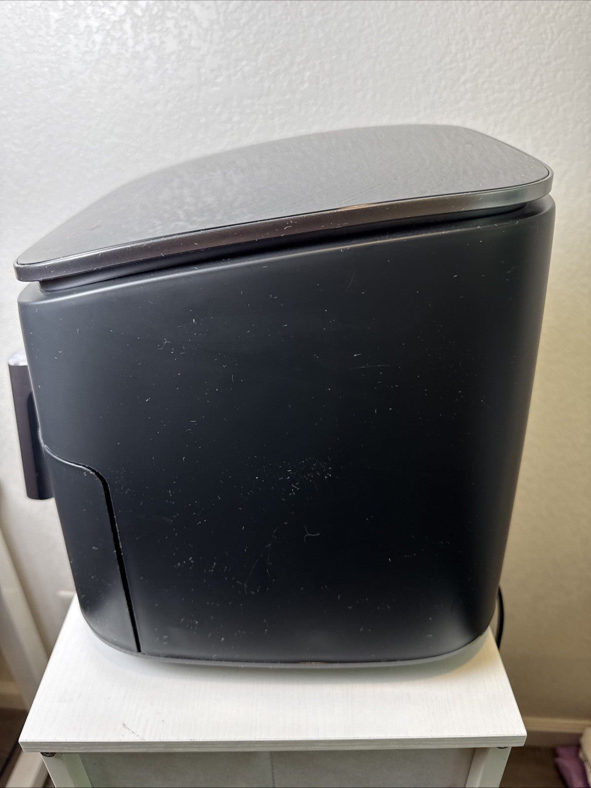 Black Cosori TurboBlaze 6-quart air fryer showing top control panel and front basket