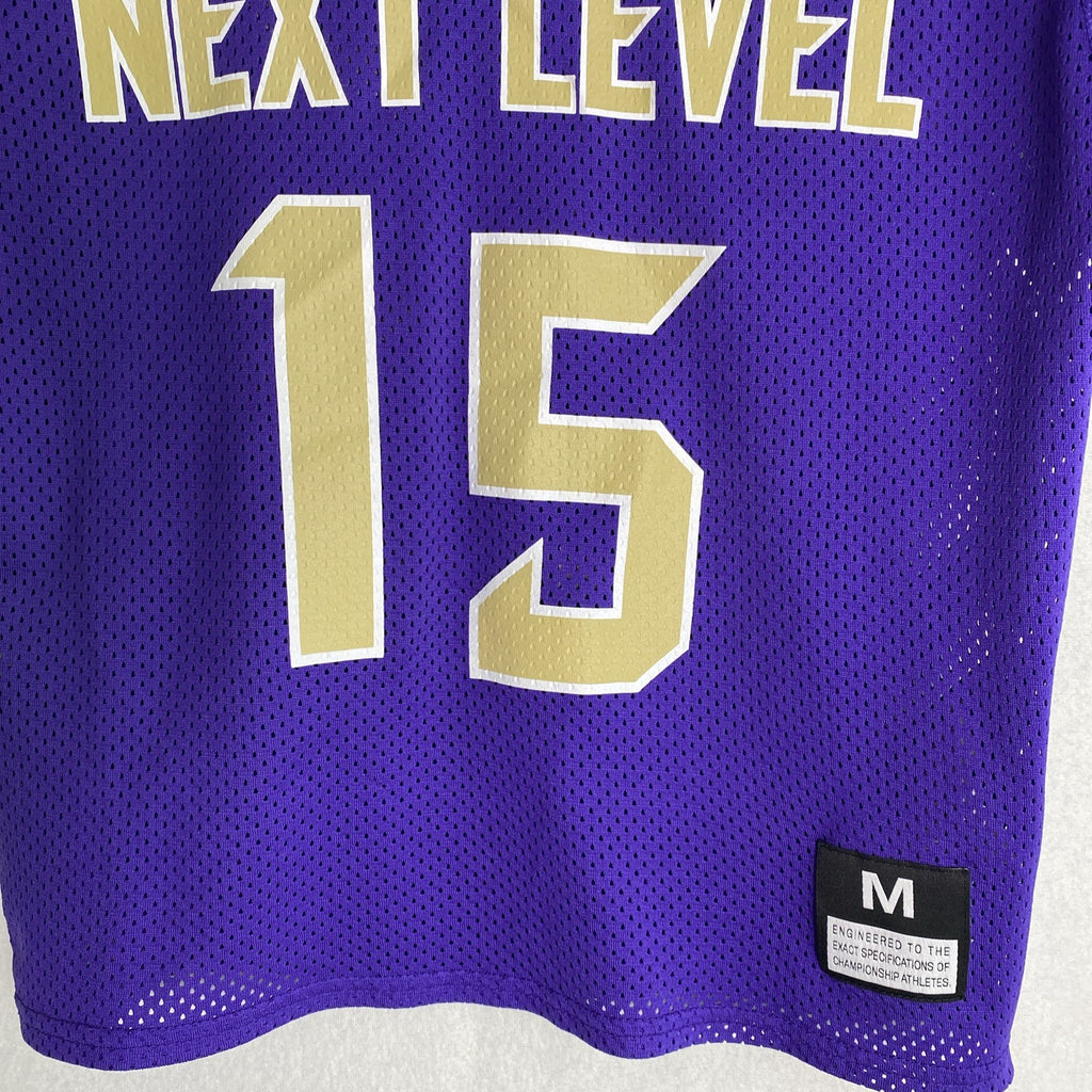 Front and back of purple Nike Dri-FIT Washington Huskies mesh jersey shirt in women's size medium with Keates 15 graphics.