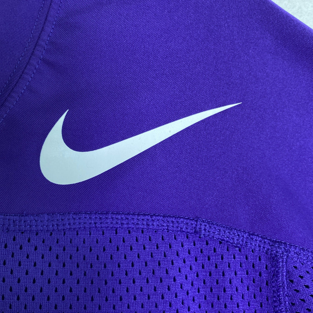 Front and back of purple Nike Dri-FIT Washington Huskies mesh jersey shirt in women's size medium with Keates 15 graphics.
